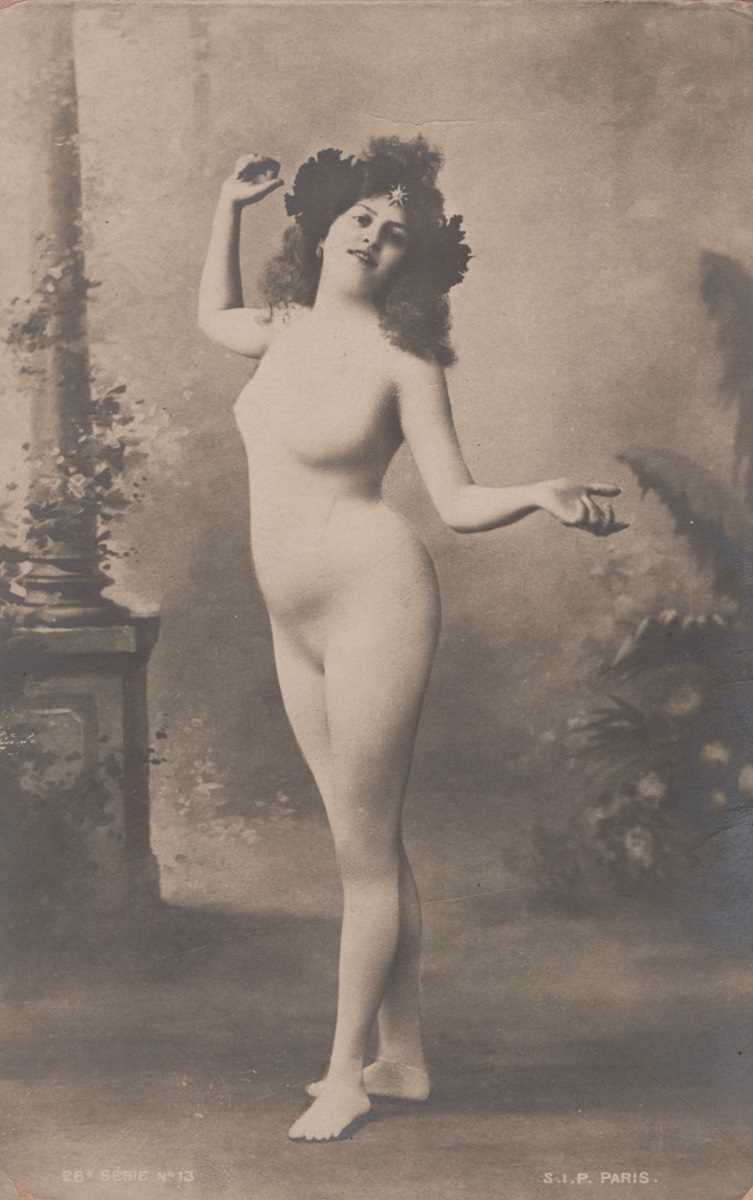 A collection of 25 postcards of erotic or risqué interest, some photographic. - Image 6 of 10