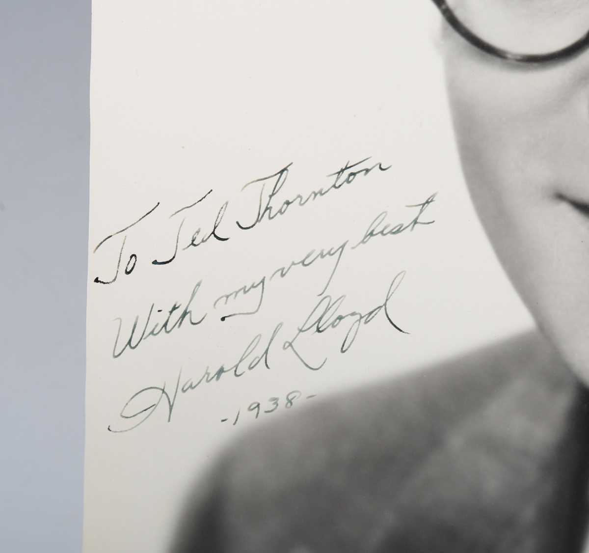 AUTOGRAPH. An autographed black and white oversized photograph signed by Harold Lloyd and - Bild 2 aus 5