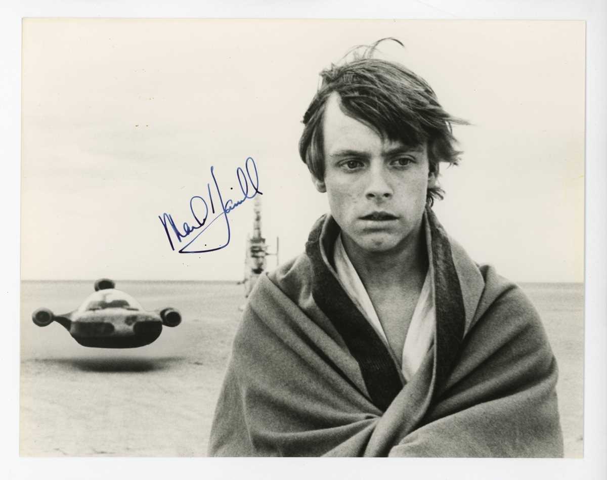 AUTOGRAPHS, STAR WARS. A group of four signed black and white photographs, comprising Mark Hamill in