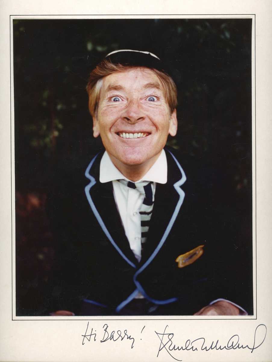 AUTOGRAPH. A mounted colour photograph signed to the mount by Kenneth Williams, overall 30.5cm x