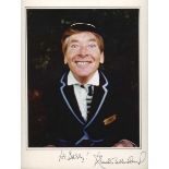 AUTOGRAPH. A mounted colour photograph signed to the mount by Kenneth Williams, overall 30.5cm x