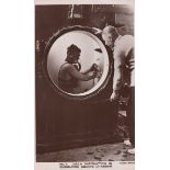 An album containing approximately 46 postcards and numerous photographs of naval interest, the