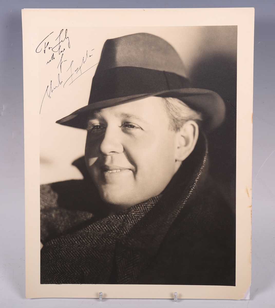 AUTOGRAPH. An autographed black and white oversized photograph signed by Charles Laughton and