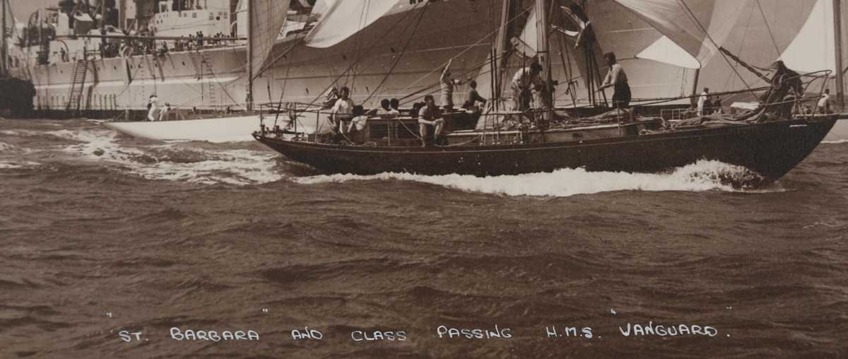 PHOTOGRAPHS. A sepia-toned photograph of a yacht titled ‘St. Barbara and Class Passing H.M.S. - Image 3 of 7