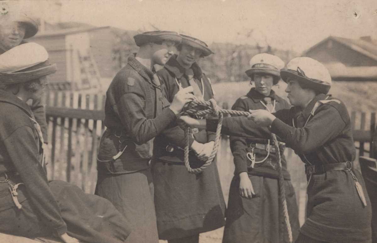 A collection of 16 photographic postcards of girl Sea Scouts. - Image 9 of 16