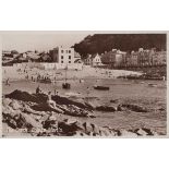 A collection of approximately 51 postcards of the village of Combe Martin in Devon, including