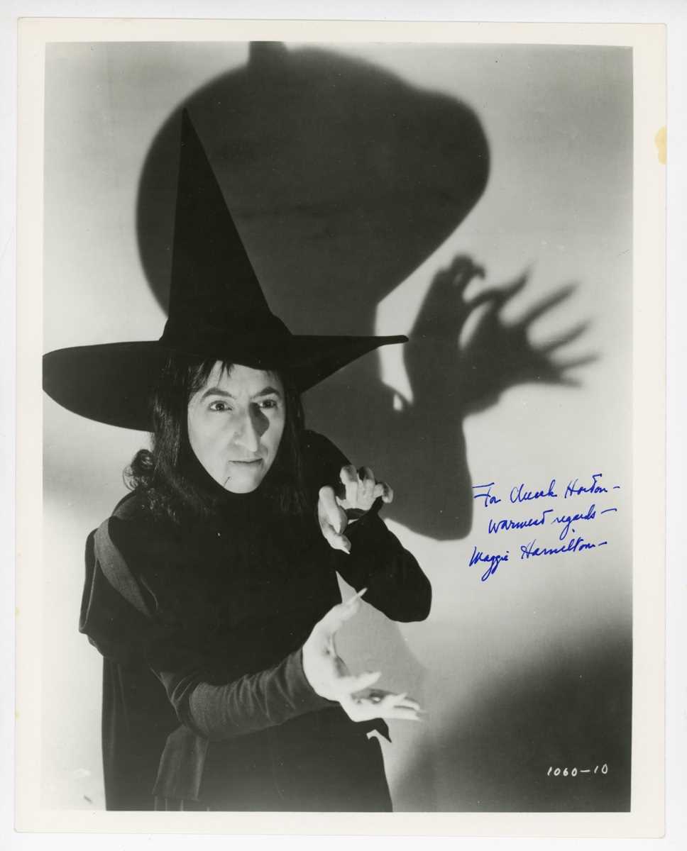 AUTOGRAPHS, THE WIZARD OF OZ. A group of seven signed photographs of actors from The Wizard of Oz,