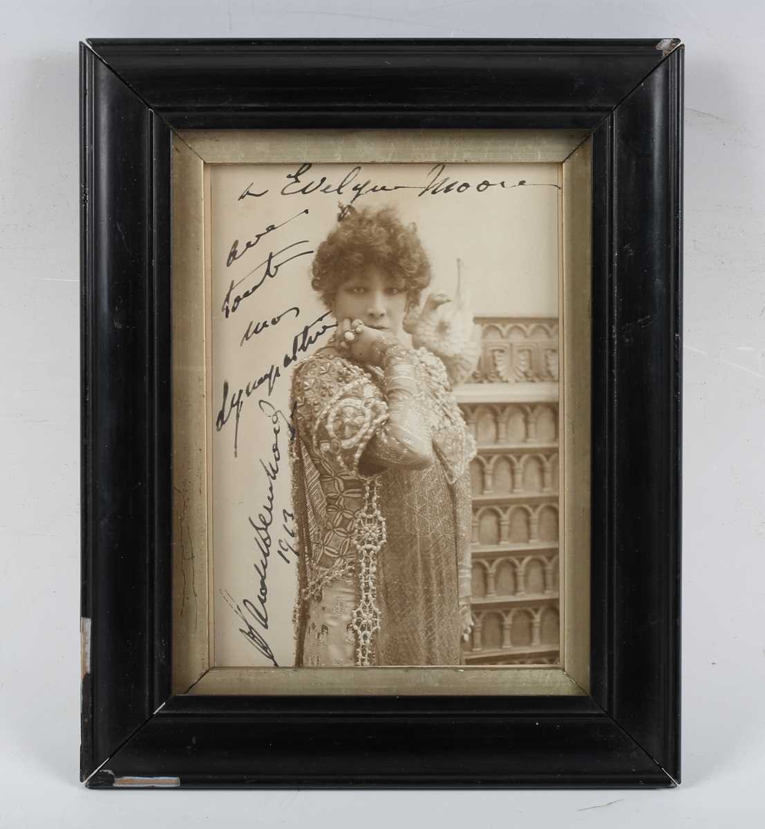 AUTOGRAPH. A signed photograph of Sarah Bernhardt, 14.5cm x 10cm, the three-quarter length