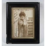 AUTOGRAPH. A signed photograph of Sarah Bernhardt, 14.5cm x 10cm, the three-quarter length