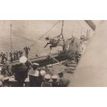 An album containing approximately 258 postcards of naval interest including portraits of ships and