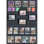 Great Britain decimal mint stamps in two stock books up to 2014 plus year books (22) 1988-2001 (face