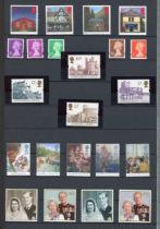 Great Britain decimal mint stamps in two stock books up to 2014 plus year books (22) 1988-2001 (face