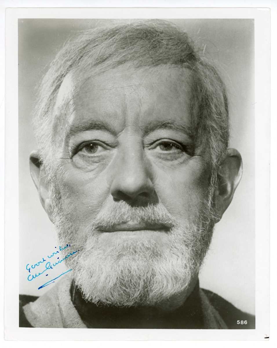 AUTOGRAPH, STAR WARS. A signed black and white photograph of Alec Guinness in costume as Obi Wan