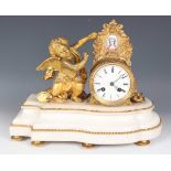 A late 19th century French ormolu and white marble mantel clock with eight day movement striking