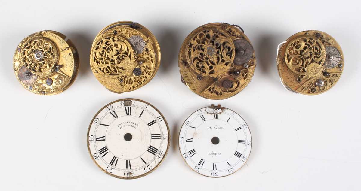 An early 18th century white enamelled pocket watch dial with black Roman hour numerals, outer Arabic