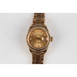 A Rolex Oyster Perpetual Datejust 18ct gold lady's bracelet wristwatch, Ref. 69178, circa 1991, with