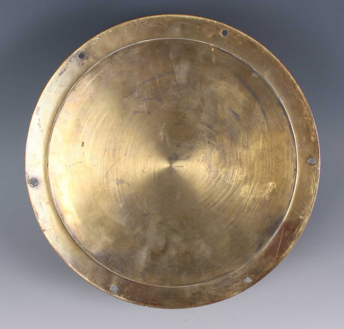 An early 20th century brass circular cased ship's style wall timepiece, the 7-inch white enamelled - Image 2 of 3