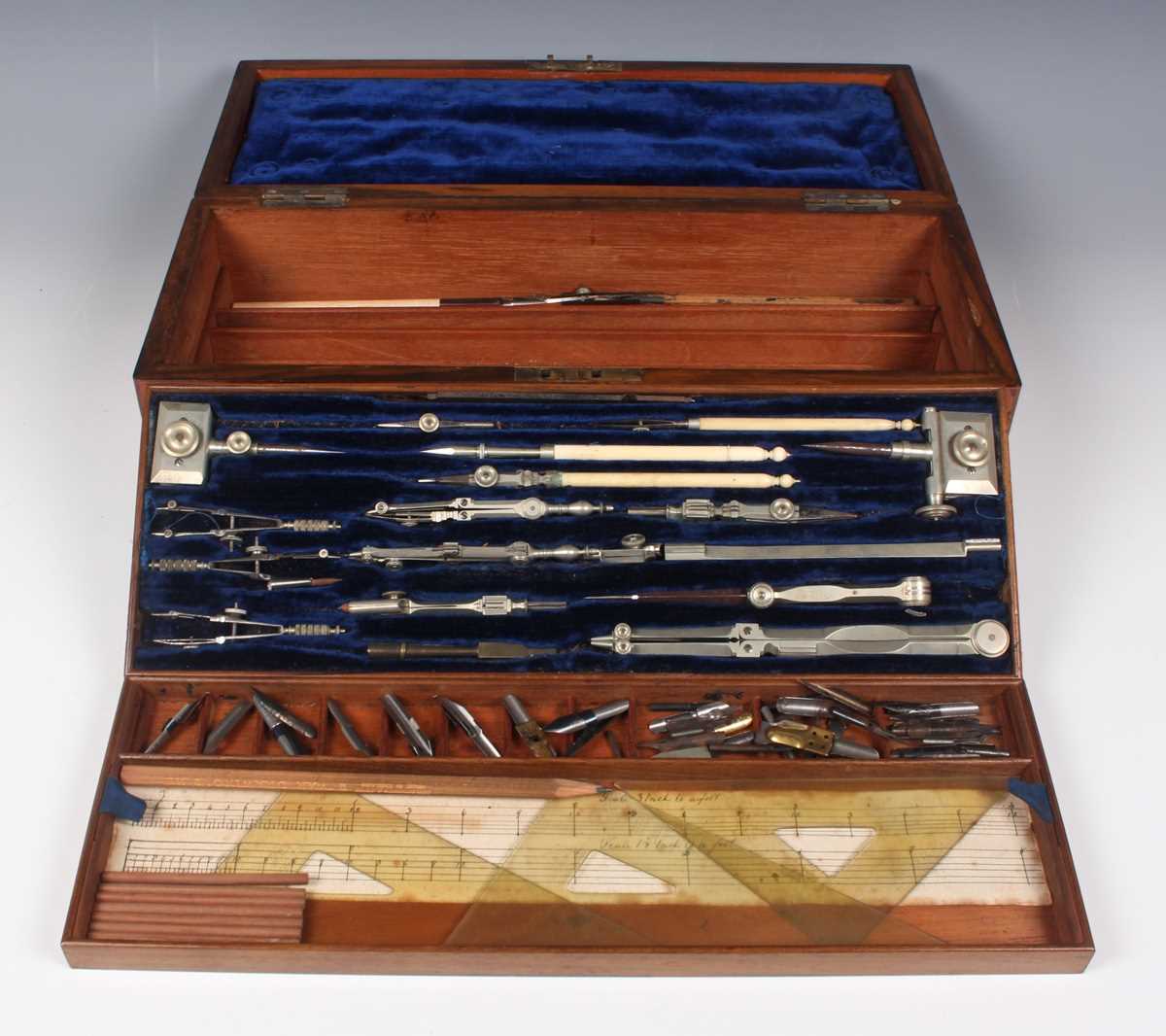 A late Victorian burr walnut drawing instrument box, fitted with two detachable trays containing
