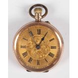 A 9ct gold cased keyless wind open faced lady's fob watch with gilt cylinder movement, base metal