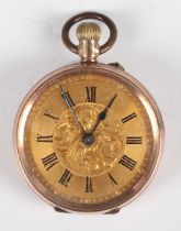 A 9ct gold cased keyless wind open faced lady's fob watch with gilt cylinder movement, base metal