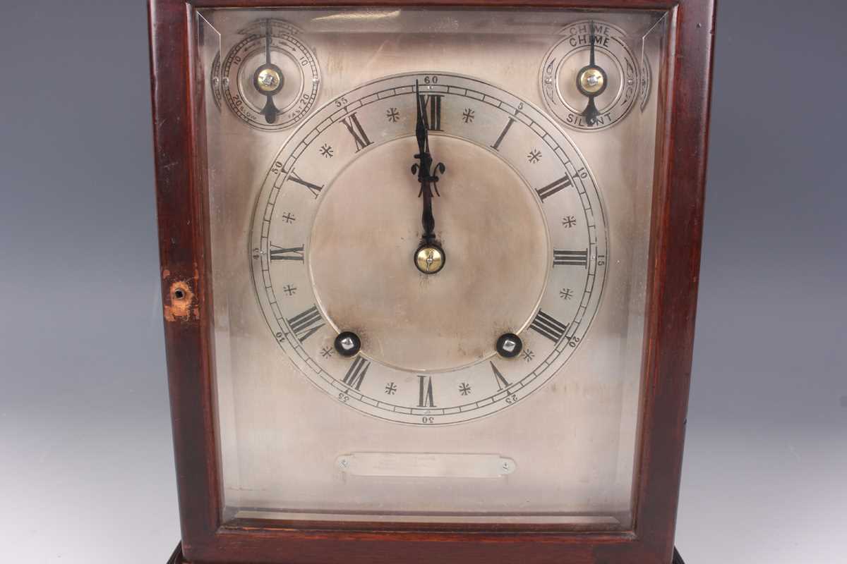 An early 20th century mahogany mantel clock with eight day movement striking on two gongs, the - Image 2 of 10