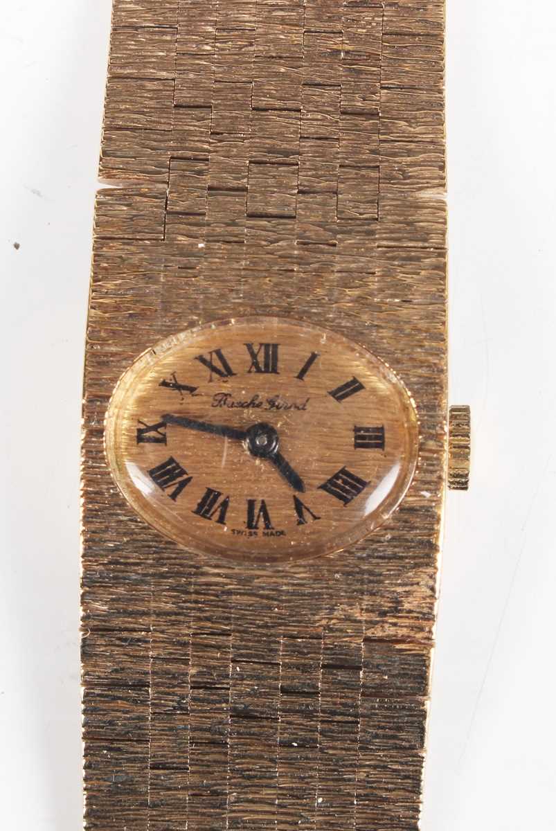 A Bueche-Girod 9ct gold bracelet wristwatch, the signed oval bark textured dial with black Roman