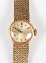 An Omega 18ct gold circular cased lady's bracelet wristwatch, circa 1969, the signed and jewelled