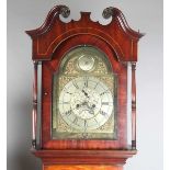 A George III mahogany longcase clock with eight day movement striking on a bell, the 12-inch brass