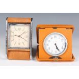 A Jaeger chrome plated and tan suede covered folding bedside travelling alarm clock with two day