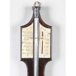 A late George III mahogany stick barometer, the silvered dial with vernier scale and signed 'Storr
