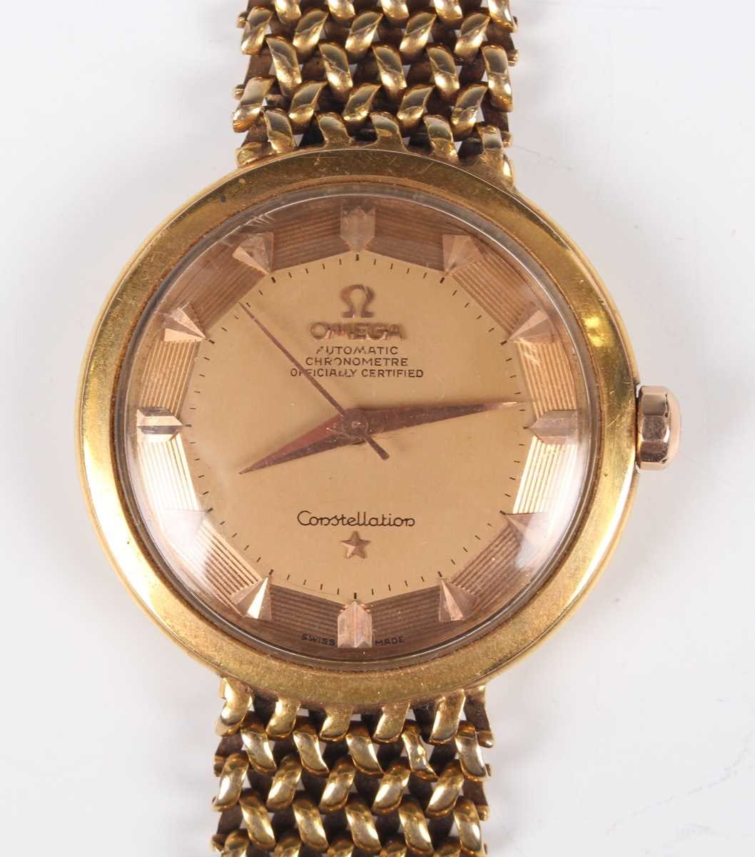 An Omega Constellation Automatic 18ct gold gentleman’s wristwatch, the signed gilt dial with arrow