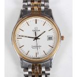 An Omega Seamaster Quartz steel and gilt metal gentleman’s bracelet wristwatch, the signed