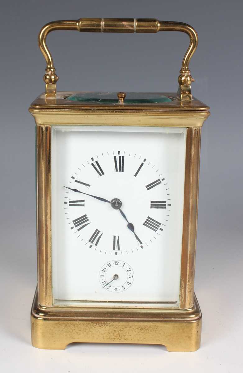 A late 19th century French lacquered brass corniche cased carriage alarm clock by E.G. Lamaille, the