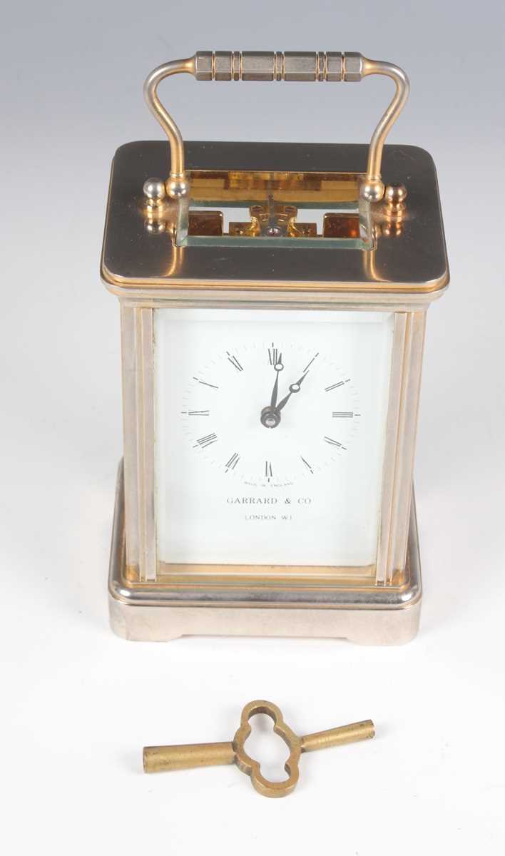 A late 20th century Garrard & Co plated brass corniche cased carriage timepiece, the signed white - Image 9 of 9