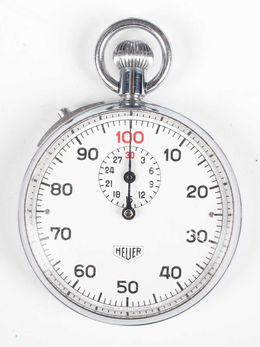 A Heuer chrome plated metal cased keyless wind open-faced stopwatch, the enamelled dial with outer