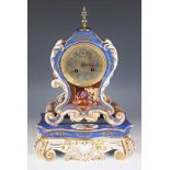 A mid-19th century French Paris porcelain cased mantel clock and stand, the eight day movement