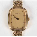 A Zenith 9ct gold lady's bracelet wristwatch with quartz movement, the signed gilt dial with dot