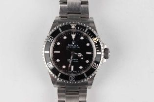 A Rolex Oyster Perpetual Submariner stainless steel gentleman's bracelet wristwatch, Ref. 14060M,
