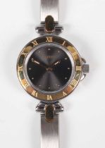 A Pequignet Quartz steel and gilt lady’s bracelet wristwatch, the gilt outer bezel with Roman