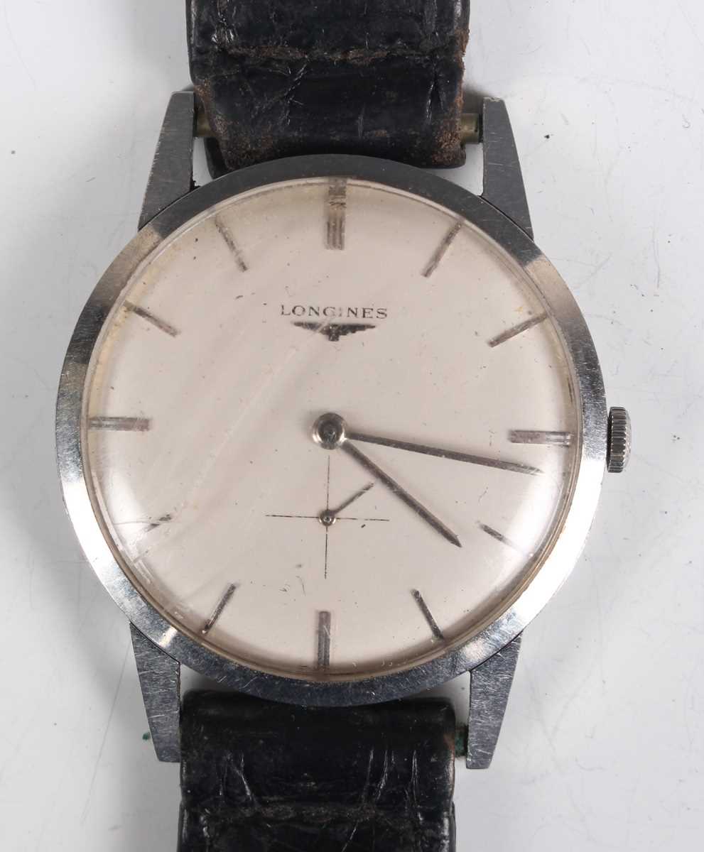 A Longines stainless steel circular cased gentleman's wristwatch, Ref. 7888 4, circa 1960, the