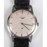 A Longines stainless steel circular cased gentleman's wristwatch, Ref. 7888 4, circa 1960, the