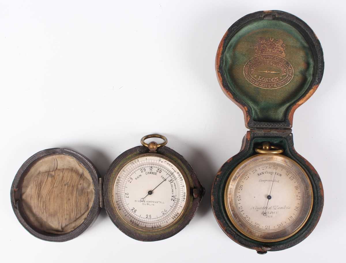 A late 19th century Negretti & Zambra gilt lacquered brass cased pocket barometer altimeter, compass