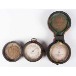 A late 19th century Negretti & Zambra gilt lacquered brass cased pocket barometer altimeter, compass