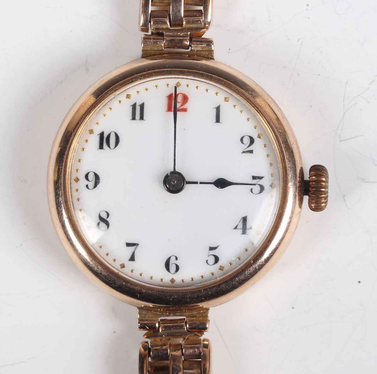 A 9ct gold circular cased lady's wristwatch, the enamelled dial with Arabic numerals, on a sprung - Image 7 of 10