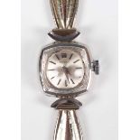 A Tissot 18ct white gold lady’s bracelet wristwatch, the signed silvered dial with baton hour