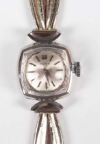 A Tissot 18ct white gold lady’s bracelet wristwatch, the signed silvered dial with baton hour