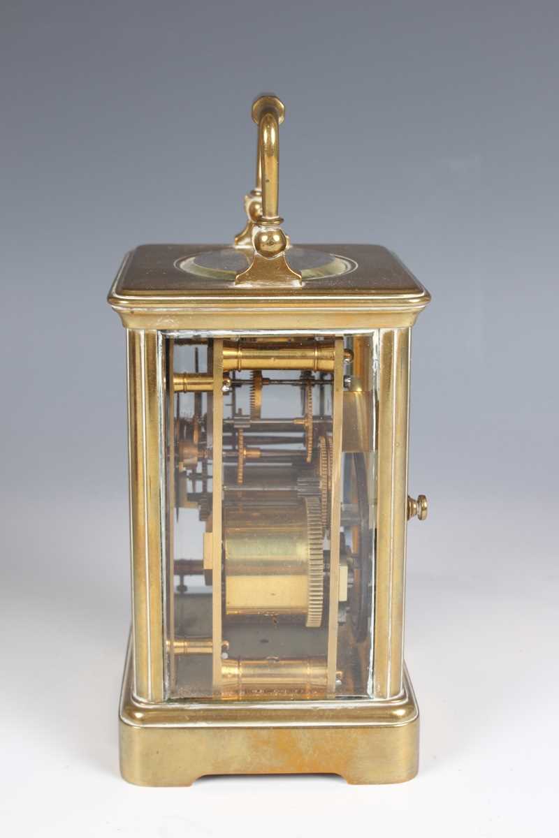 A late 19th century French brass corniche cased carriage clock with eight day movement striking on a - Image 4 of 8