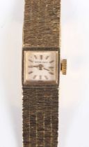 A Bueche-Girod 18ct gold lady’s bracelet wristwatch with signed square silvered dial with baton hour