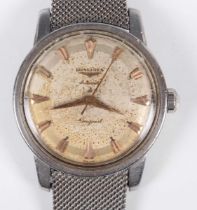 A Longines Automatic Conquest stainless steel circular cased gentleman's wristwatch, circa 1957, the