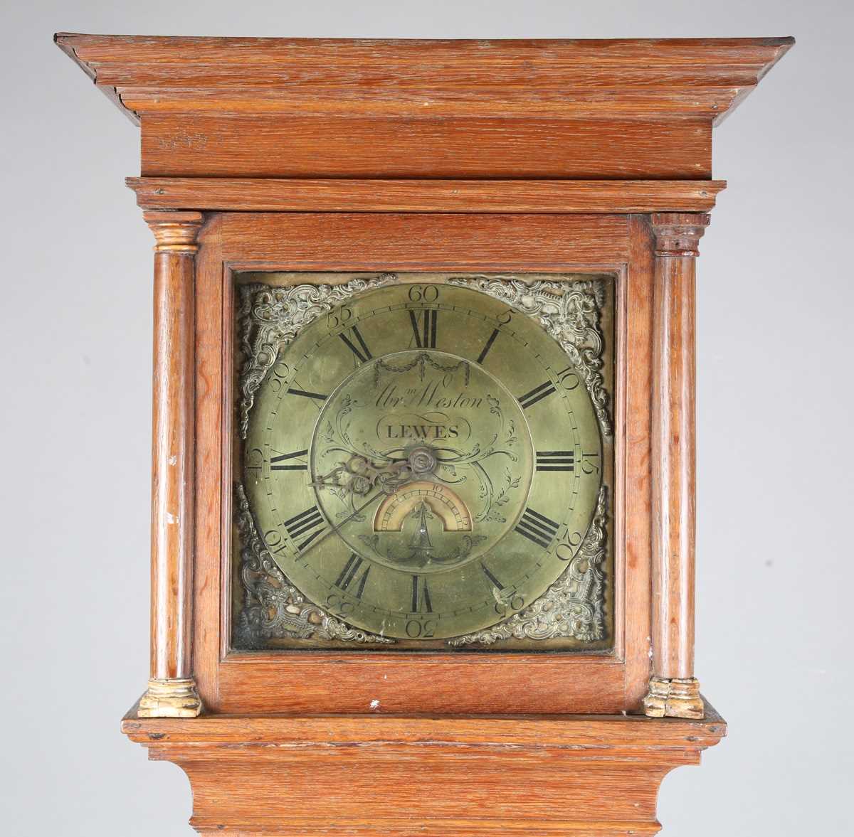 A mid-18th century oak longcase clock, the thirty hour movement striking on a bell via an outside